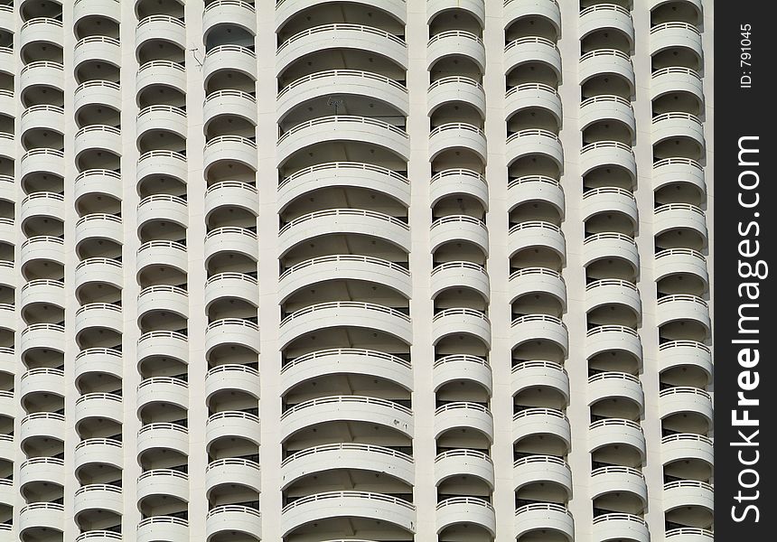 Balconies off large, circular apartment building