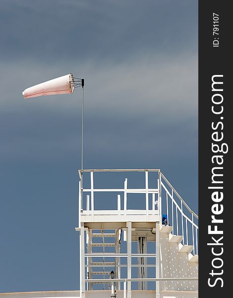 Wind sock on oil storage tank