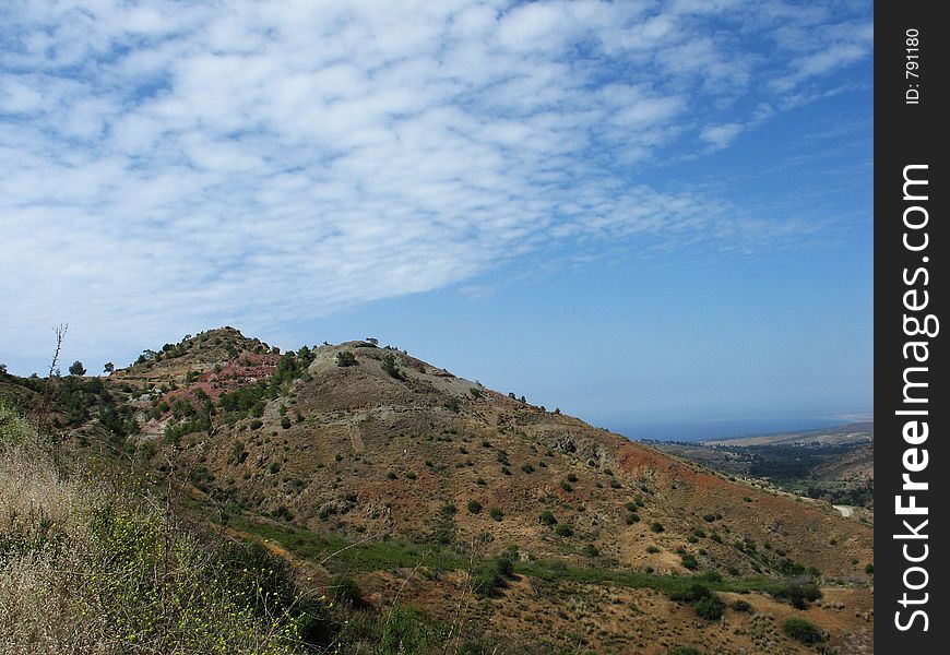 Light clouds over the mountains of Cyprus. Light clouds over the mountains of Cyprus