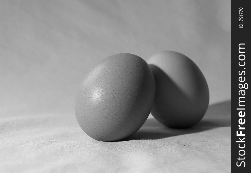 Black and white shot of two eggs. Black and white shot of two eggs.