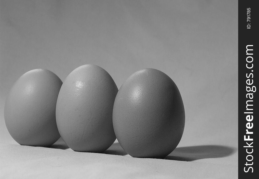 Black and white shot of three eggs. Black and white shot of three eggs.