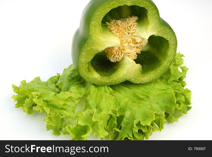 Green pepper on salad - white background. Green pepper on salad - white background