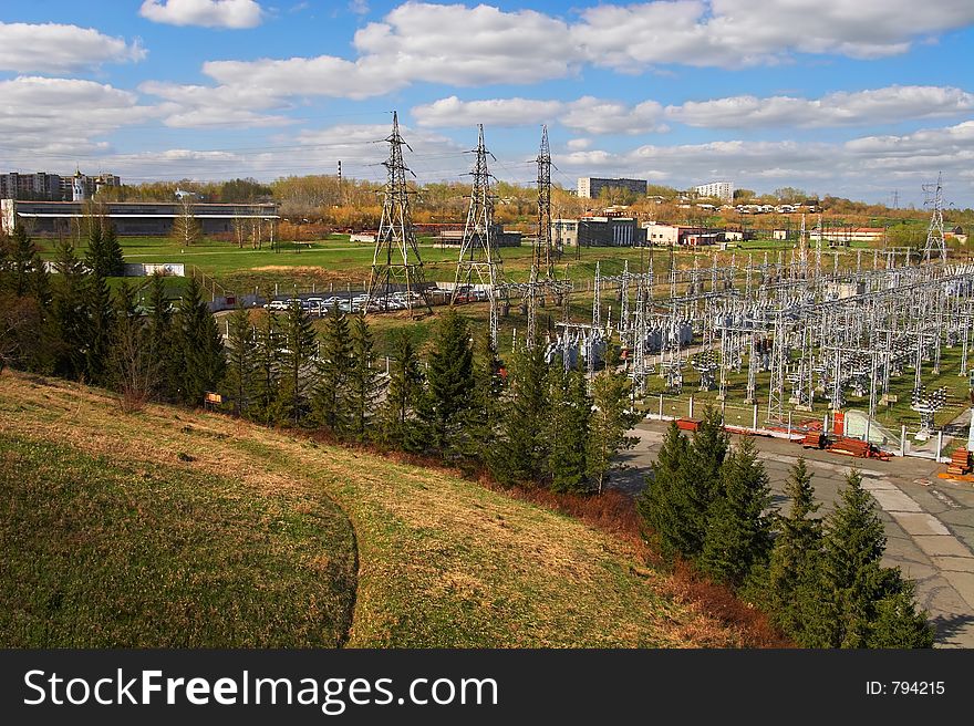 Electric power station and river. Spring.