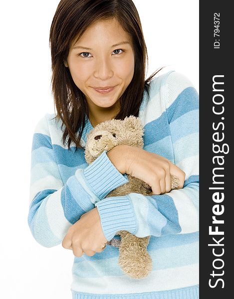 A pretty teenage girl with teddy bear. A pretty teenage girl with teddy bear