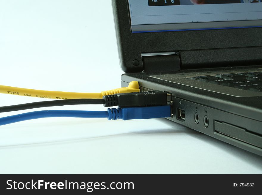 View of cables attached to a laptop