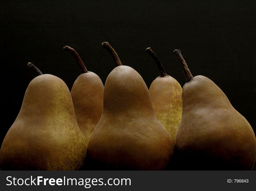 Pears on black background