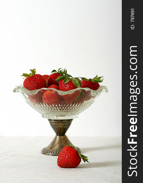 Strawberries in vintage glass bowl