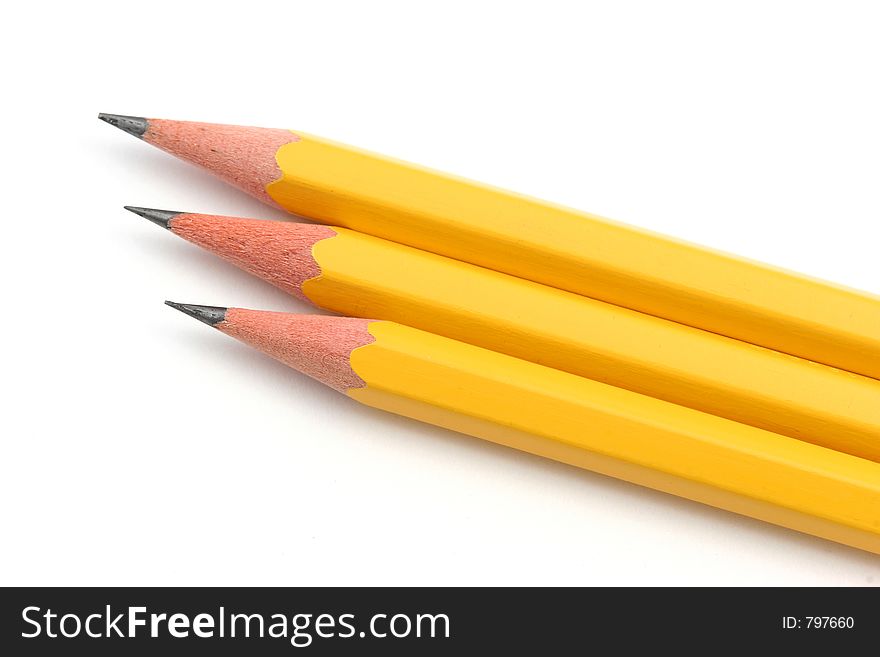 Group of pencils with sharp points over a white background. Group of pencils with sharp points over a white background.
