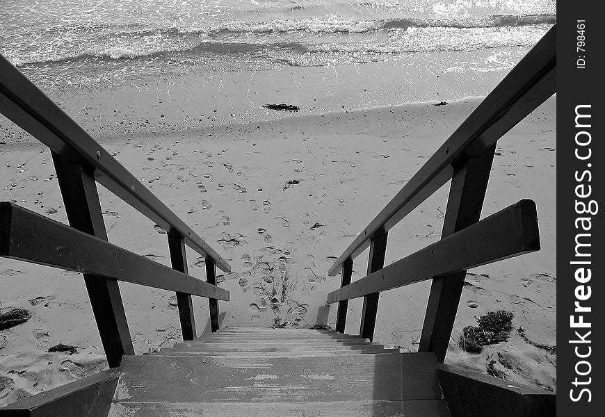 Shot from a high angle to show an intriguing shot down to the beach and sea. Shot from a high angle to show an intriguing shot down to the beach and sea.