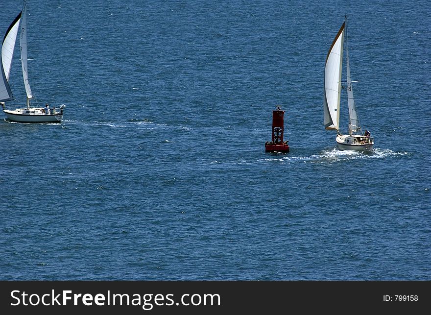 Two sail boats on the ocean