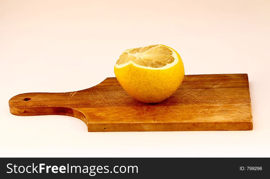 A lemon on a cooking plate, isolated