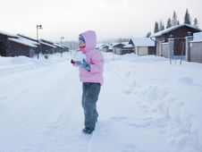 Girl Playing With Snow Stock Photos