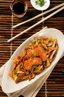 Deep Fried Scampi With Asian Noodles And Green Pea Stock Photos Deep Fried Scampi With Asian Noodles And Green Pea Stock Photos