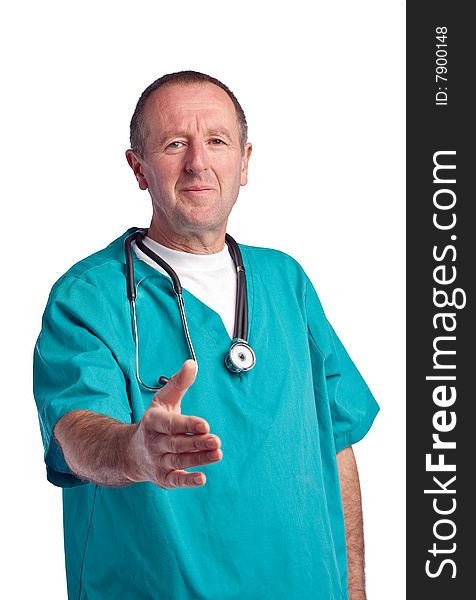 Mature male doctor/surgeon in scrubs, isolated. Mature male doctor/surgeon in scrubs, isolated.
