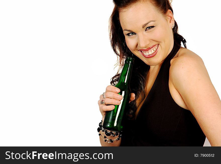 Smiling brunette with a bottle of beer isolated on white