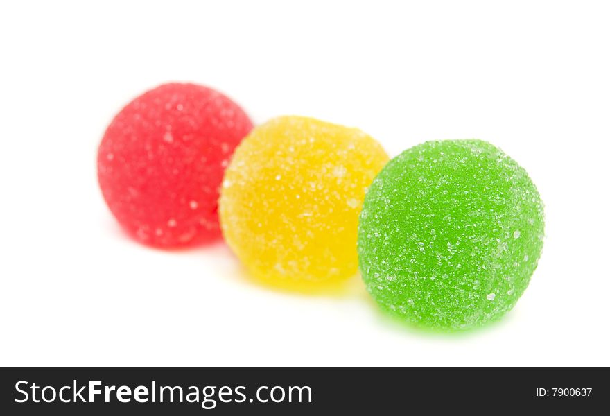 Sweet fruit color candy on white background