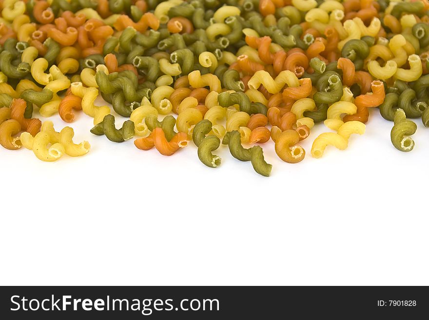 Colorful noodles frame on a white background. Soft focus. Colorful noodles frame on a white background. Soft focus