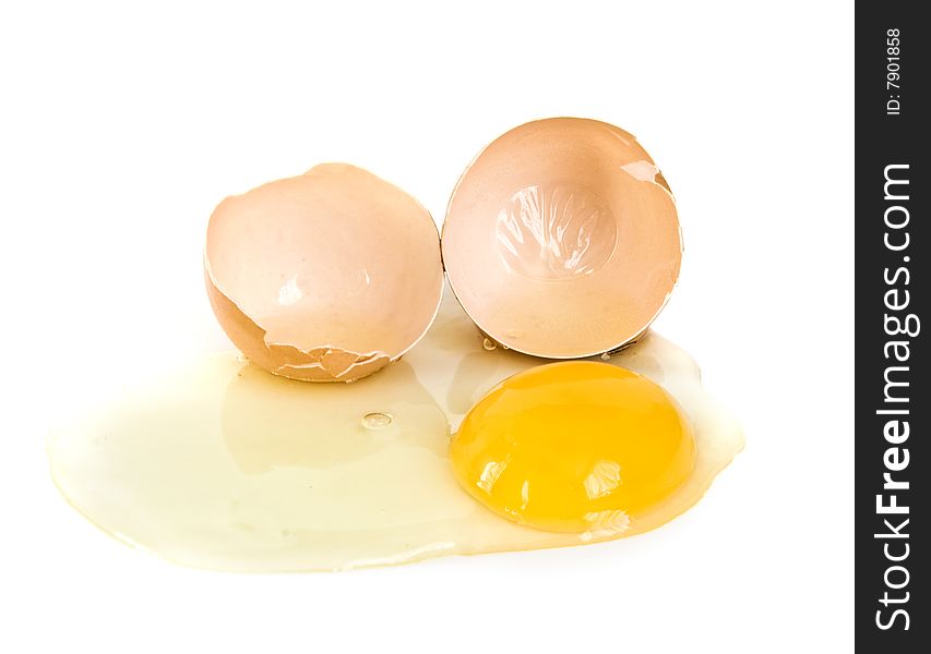 Cracked egg closeup on isolated white background