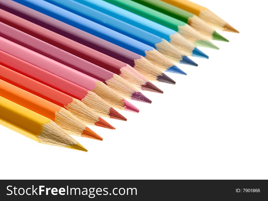 Row of pencils isolated on white background