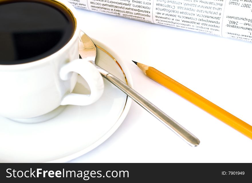 Cup Of Coffee And Newspaper On White