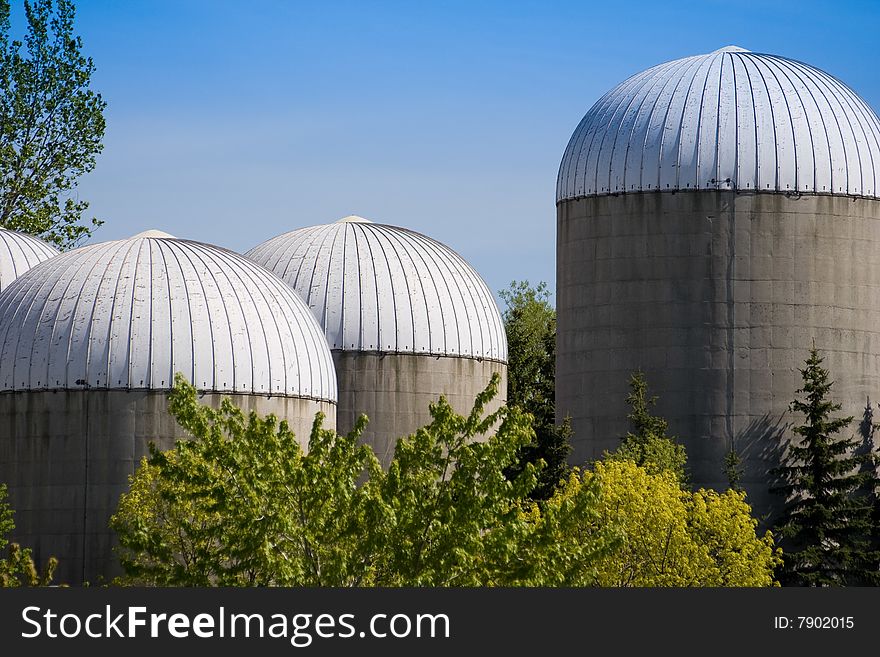 Group of agricultural urban futuristic style towers at the Ontario island. Group of agricultural urban futuristic style towers at the Ontario island