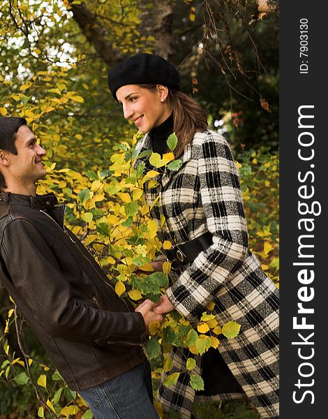 Young Couple In Autumn Park