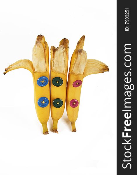 Opened bananas standing with buttons on body. Opened bananas standing with buttons on body