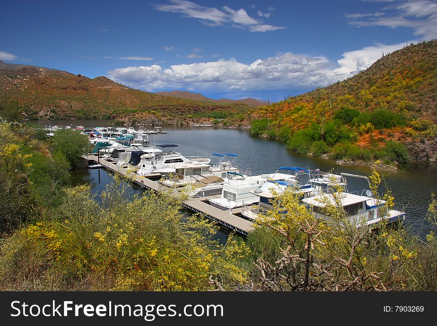 Boat harbor  in the Superstition Mtns in Ariziona with clouds snd blue sky