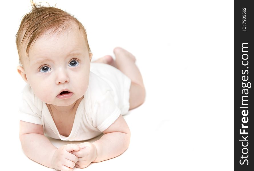 Little baby girl on a white background