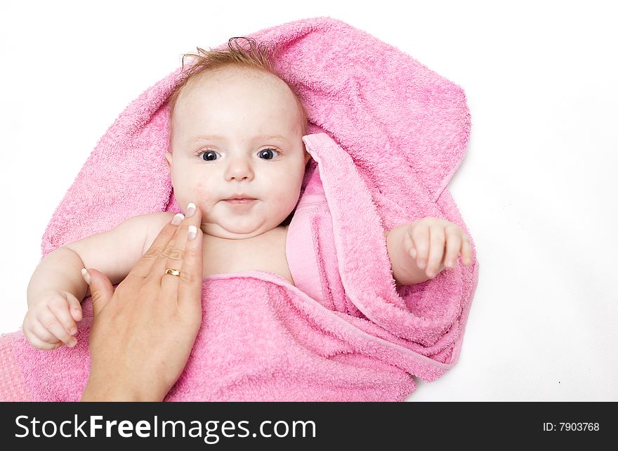 Little baby after bath on white