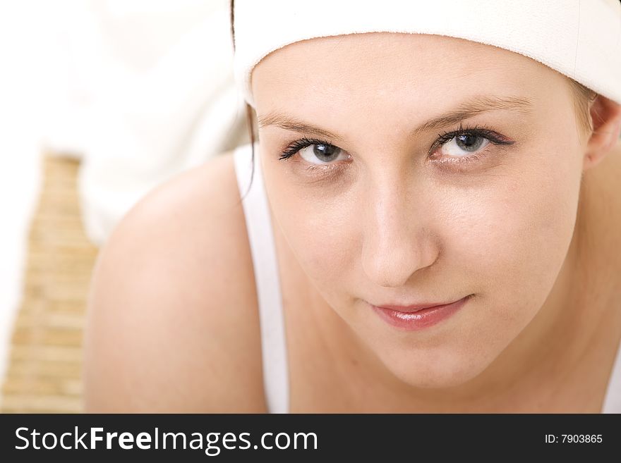 Woman in spa on white