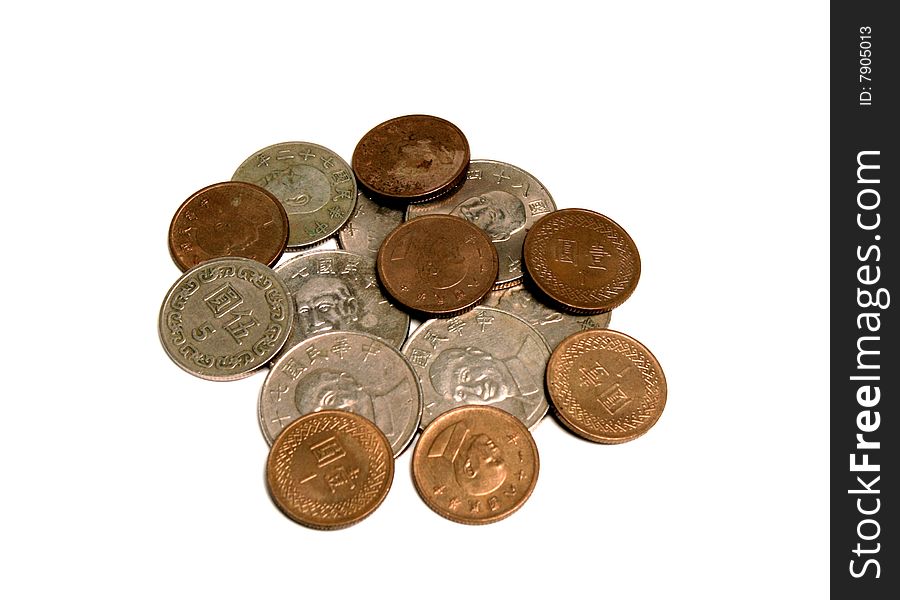 Hong Kong coins in a small pile on a white background