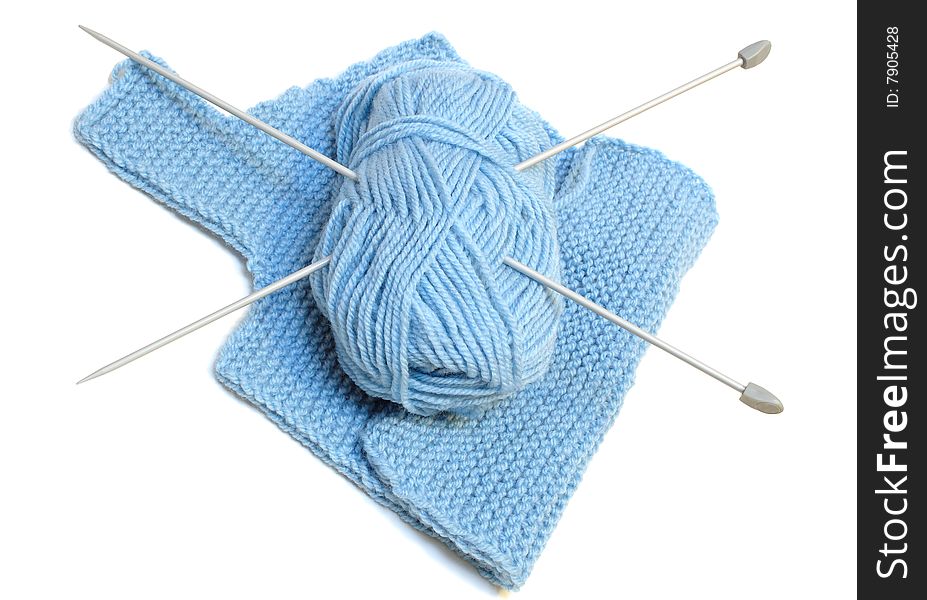 Knitting Needles, Yarn  And Knitting Cloth.