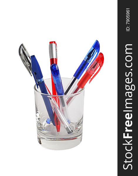 Color pens in a glass are isolated on the white background