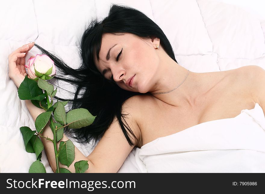 Portrait of a young and ver attractive lady in her bed