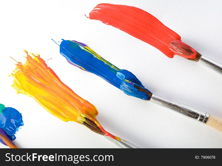 Stock photo: an image of  paintbrushes painting wide stripes
