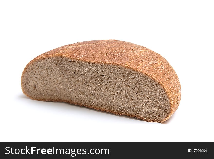 Half of rye bread isolated on a white background. Half of rye bread isolated on a white background.