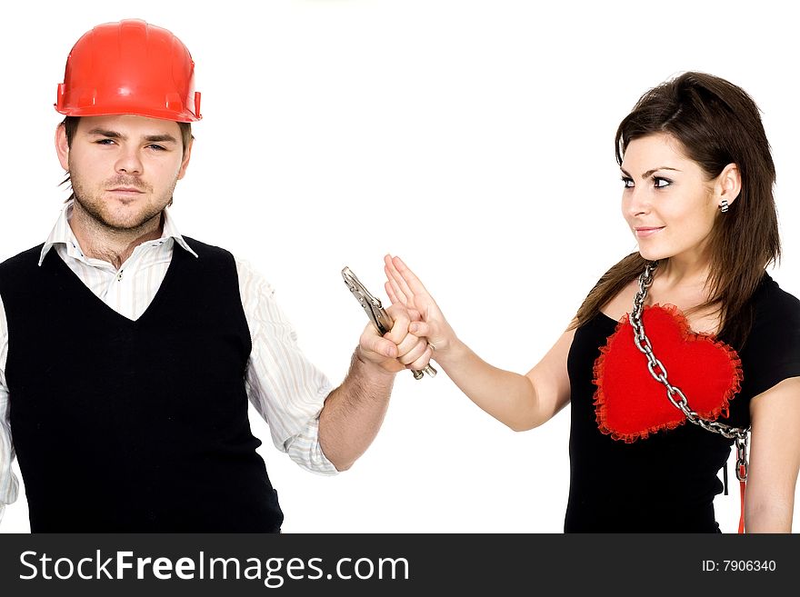 Stock photo: an image of man with pliers in his hands and woman with heart and chain. Stock photo: an image of man with pliers in his hands and woman with heart and chain