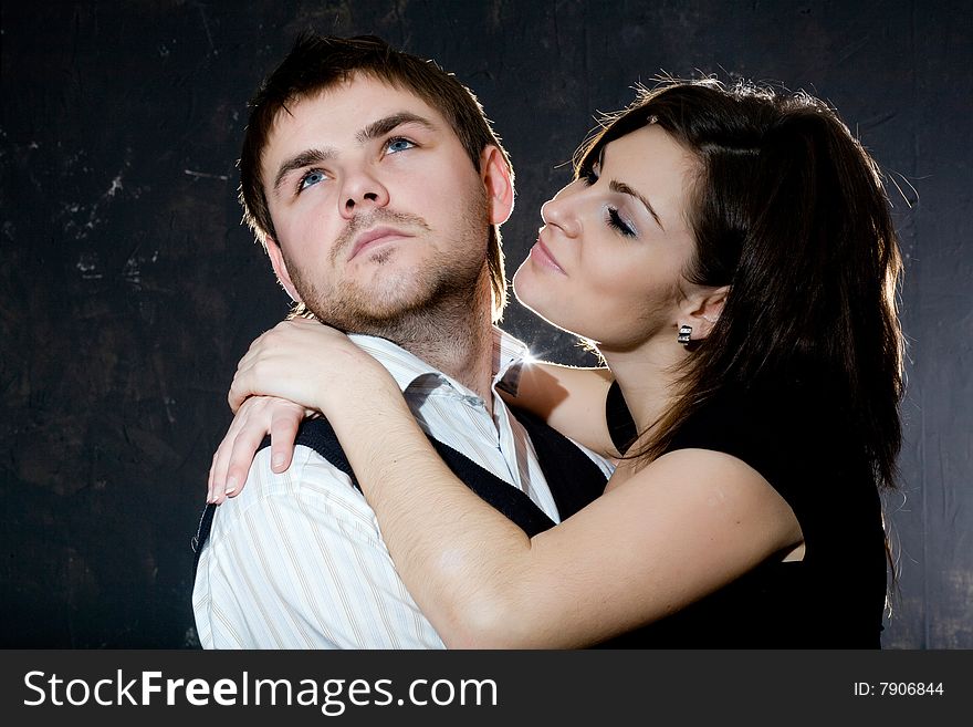 Stock photo: an image of a man and a woman embracing. Stock photo: an image of a man and a woman embracing