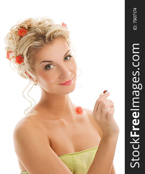 Beautiful young woman with ladybug on her hand. Spring concept