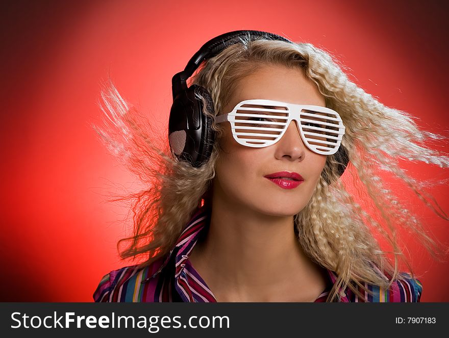 Woman with shutter glasses and headphones