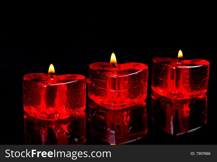 Candles in the form of heart.