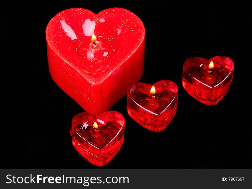 Candles in the form of heart.