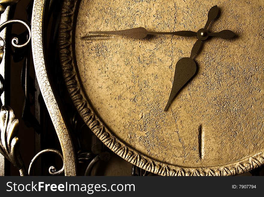 A retro styled forged clock face. A retro styled forged clock face