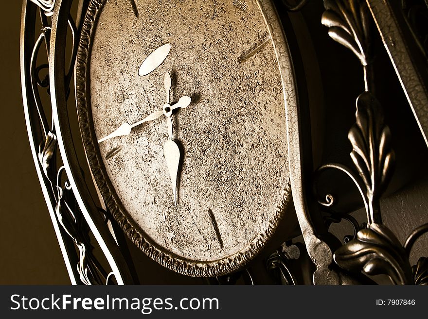 A retro styled forged clock face. A retro styled forged clock face