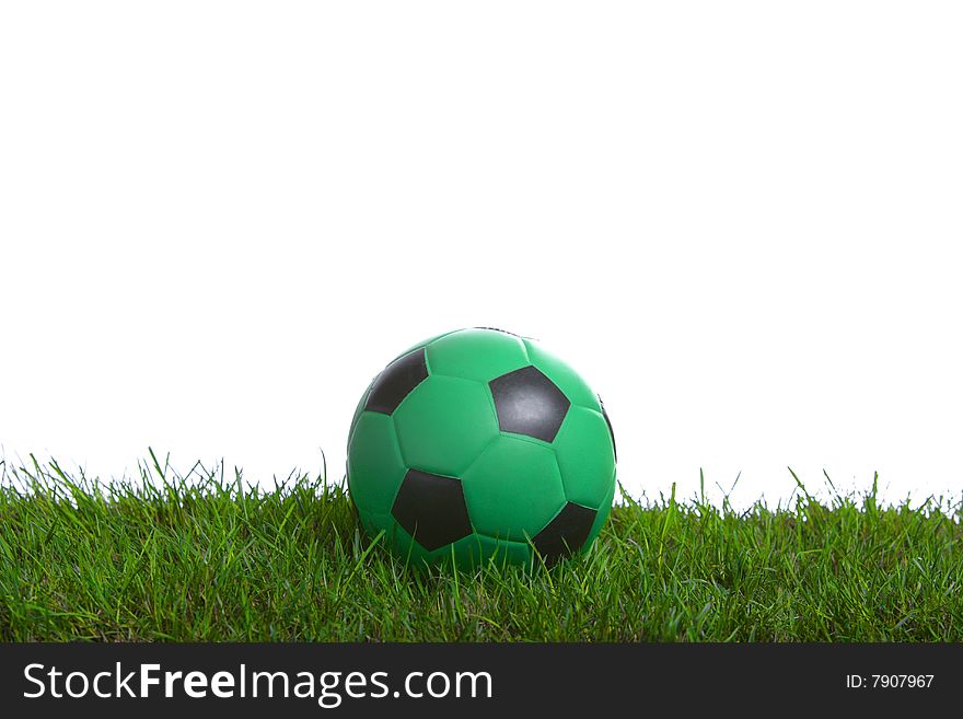 Soccer ball in the studio on grass