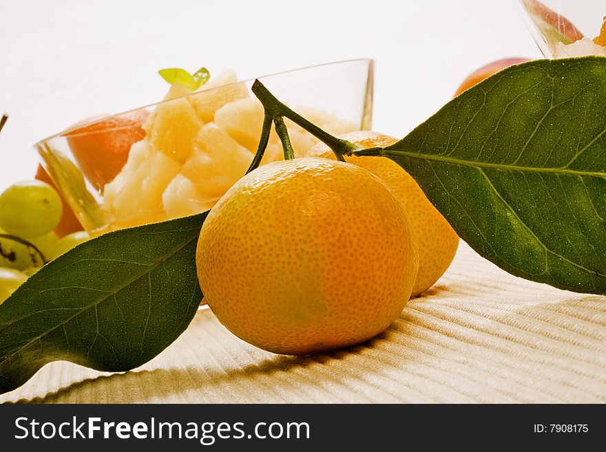 Two mandarins fruit with leaves. Two mandarins fruit with leaves
