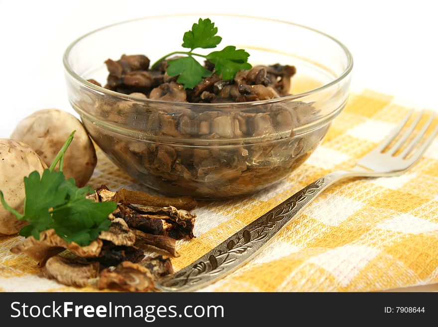 Dish prepared with mushrooms isolated on a white background