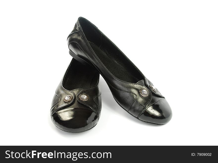 Black womanish shoes on a white background