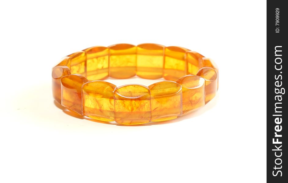 Amber bracelet isolated on white background, closeup